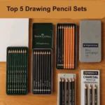 ,Top 5 drawing pencils for artists with accessories on a wooden desk